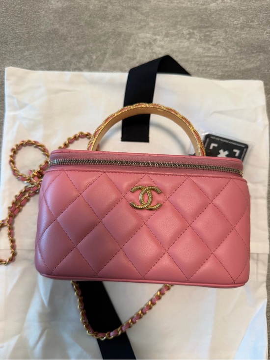 CHANEL Handbags - Lambskin Quilted Metal Twist Small Top Handle Vanity Case With Chain Pink.